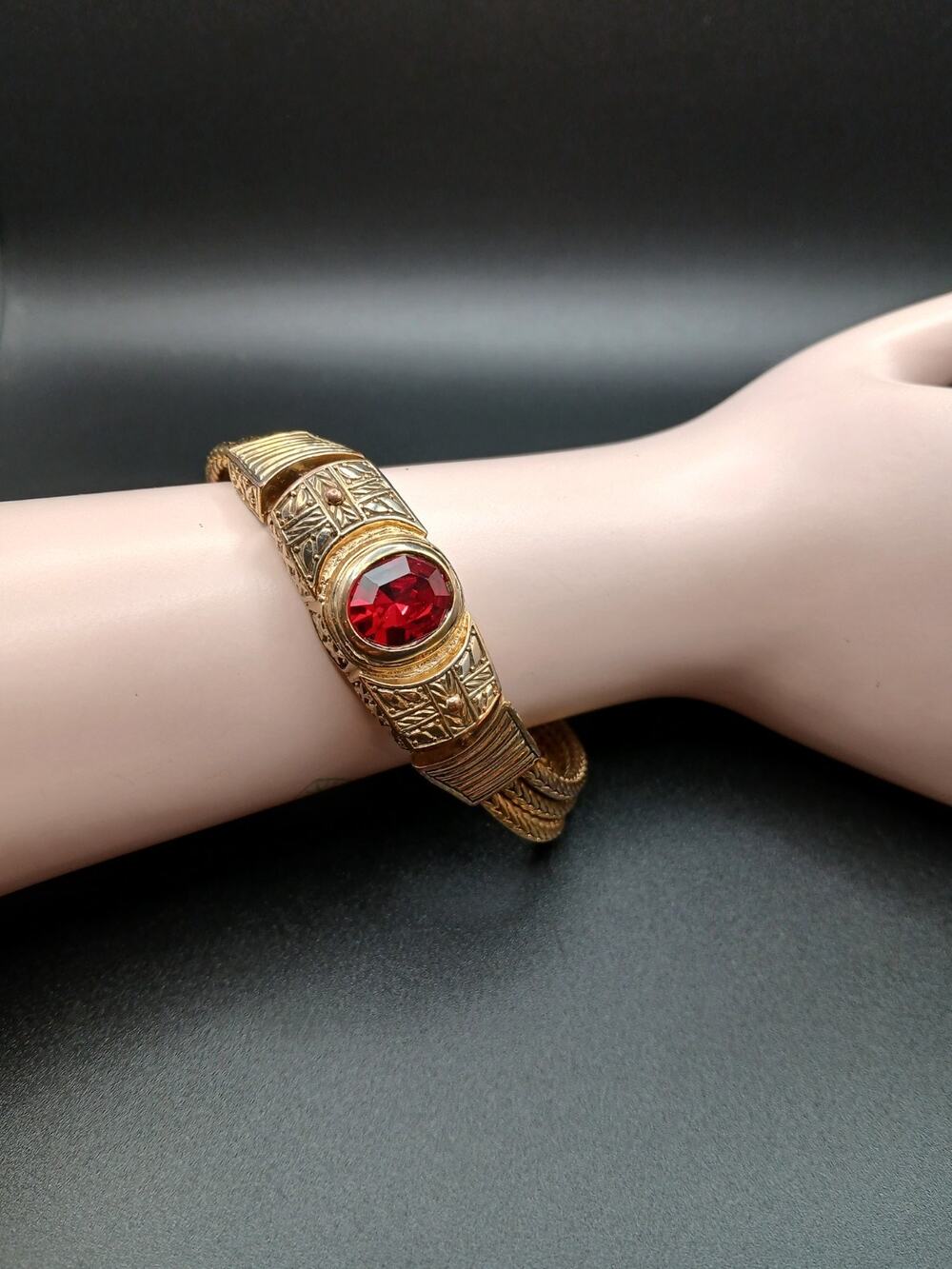 Vintage JC Signed Goldtone Ornate Bracelet with Red Faux Ruby Cabochon Magnetic